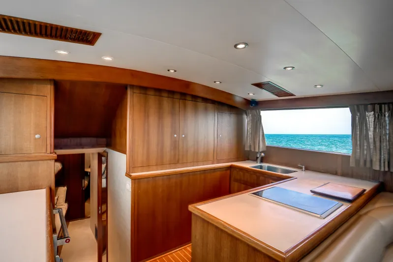 Spiros Yacht Photos Pics Luxurious 1972 Jim Smith Custom Convertible yacht interior with ocean view.