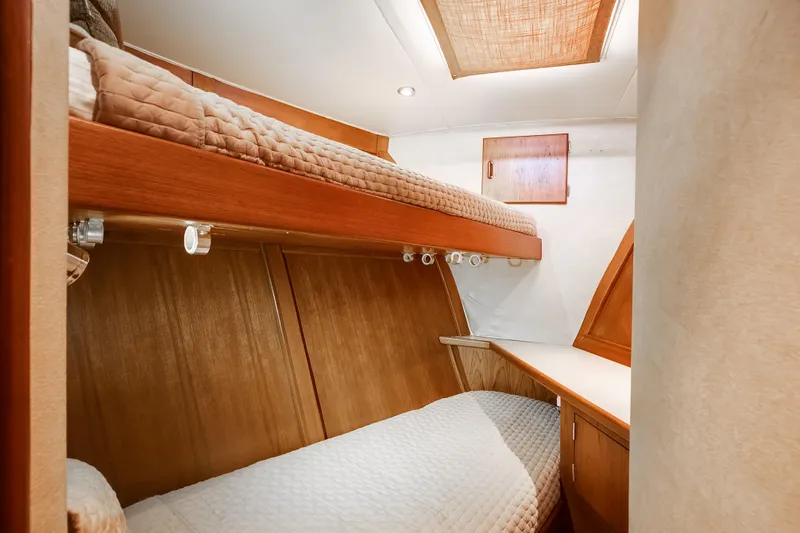 Spiros Yacht Photos Pics Interior of 1972 Jim Smith Custom Convertible with cozy wooden bunk beds.