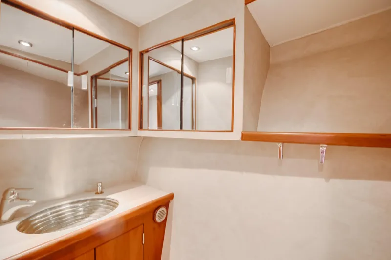 Spiros Yacht Photos Pics Luxurious bathroom interior in 1972 Jim Smith Custom Convertible yacht.