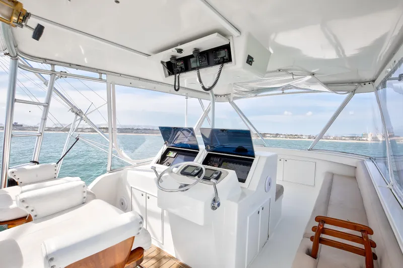 Spiros Yacht Photos Pics Interior of 1972 Jim Smith Custom Convertible yacht with modern navigation equipment.