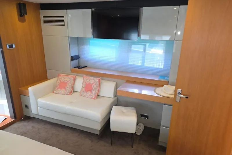  Yacht Photos Pics Luxurious interior of 2013 Fairline Targa 62 GT yacht with modern sofa and TV.