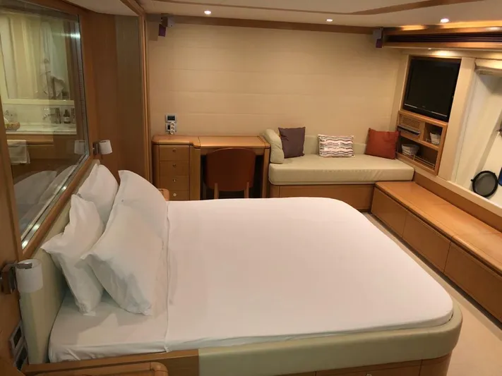 Mar Azul Yacht Photos Pics Luxurious cabin interior of 2008 Ferretti Yachts 830 with bed, seating, and TV.
