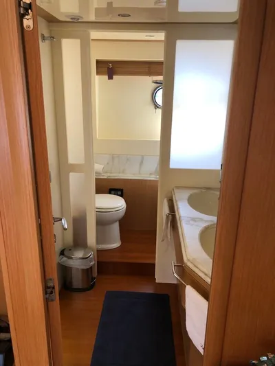 Mar Azul Yacht Photos Pics Luxurious bathroom in 2008 Ferretti Yachts 830, featuring dual sinks and modern design.