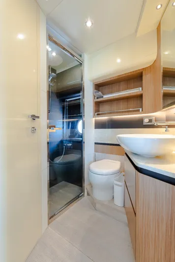 O Sea D Yacht Photos Pics Luxurious bathroom on 2017 Absolute 50 Fly yacht with modern fixtures and elegant design.