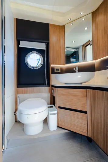 O Sea D Yacht Photos Pics Luxurious bathroom in 2017 Absolute 50 Fly yacht with modern fixtures and wood accents.