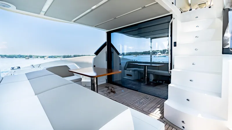 O Sea D Yacht Photos Pics Luxurious 2017 Absolute 50 Fly yacht interior with seating, table, and stairs.