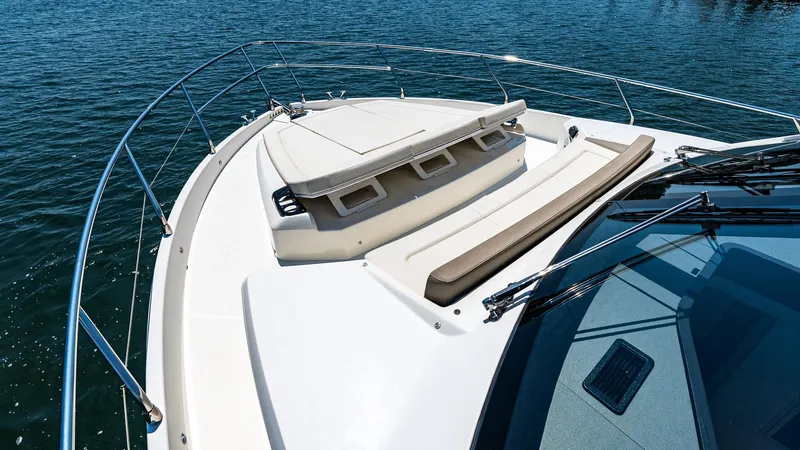 O Sea D Yacht Photos Pics 2017 Absolute 50 Fly yacht deck with sunbathing area on calm water.