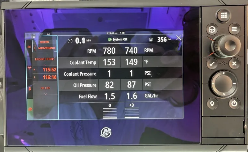  Yacht Photos Pics 2023 Bertram 39 CC dashboard displaying engine metrics: RPM, coolant temperature, oil pressure, and fuel flow.