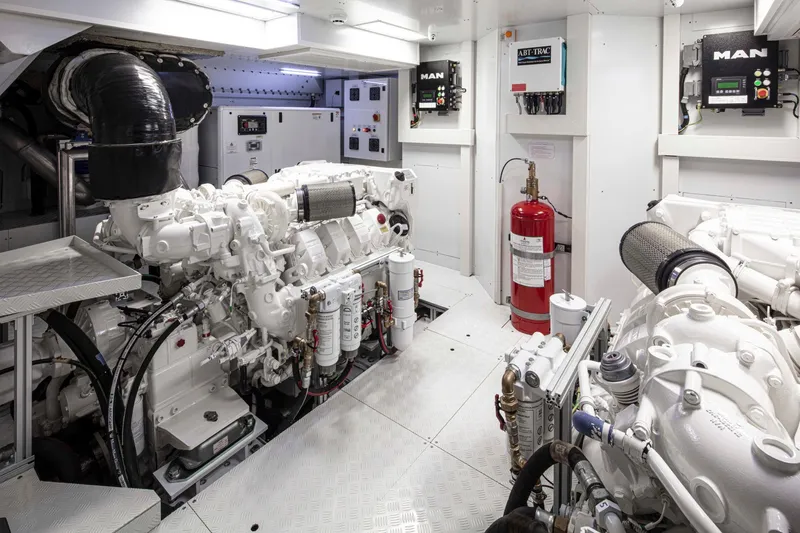  Yacht Photos Pics Engine room of 2023 Custom Line Navetta 30 yacht with advanced machinery and controls.