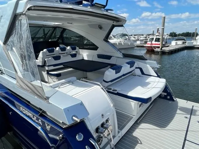  Yacht Photos Pics 2022 Formula 400 Super Sport Crossover luxury boat docked at marina.