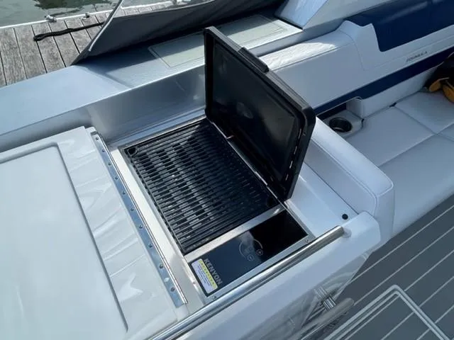  Yacht Photos Pics 2022 Formula 400 Super Sport Crossover boat with built-in grill on deck.