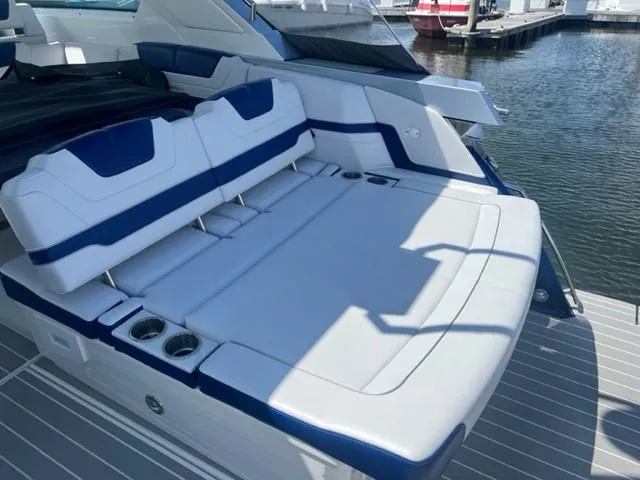  Yacht Photos Pics 2022 Formula 400 Super Sport Crossover boat with luxurious seating at the dock.