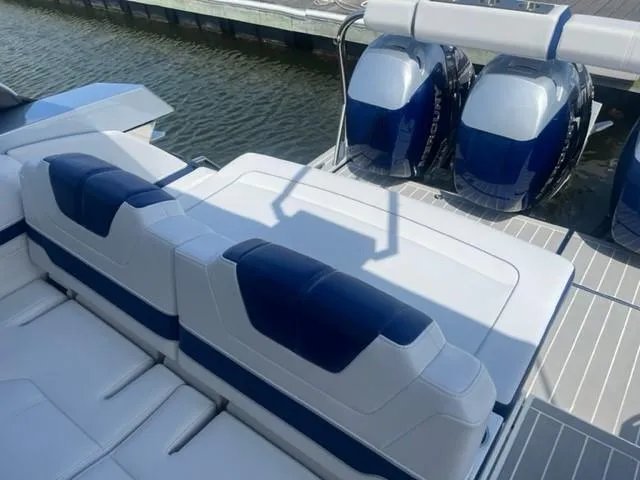  Yacht Photos Pics 2022 Formula 400 Super Sport Crossover boat with twin outboard engines and luxurious seating.