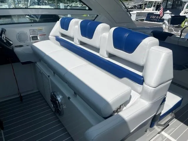  Yacht Photos Pics 2022 Formula 400 Super Sport Crossover boat interior with white and blue seating.