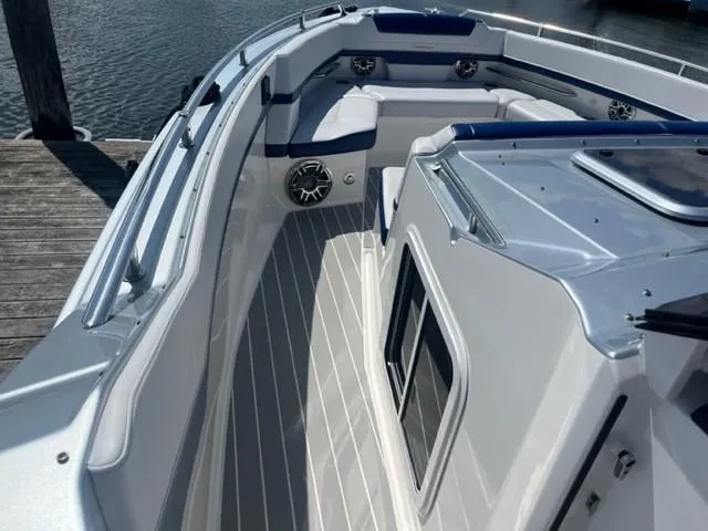  Yacht Photos Pics 2022 Formula 400 Super Sport Crossover boat interior with seating and speakers.