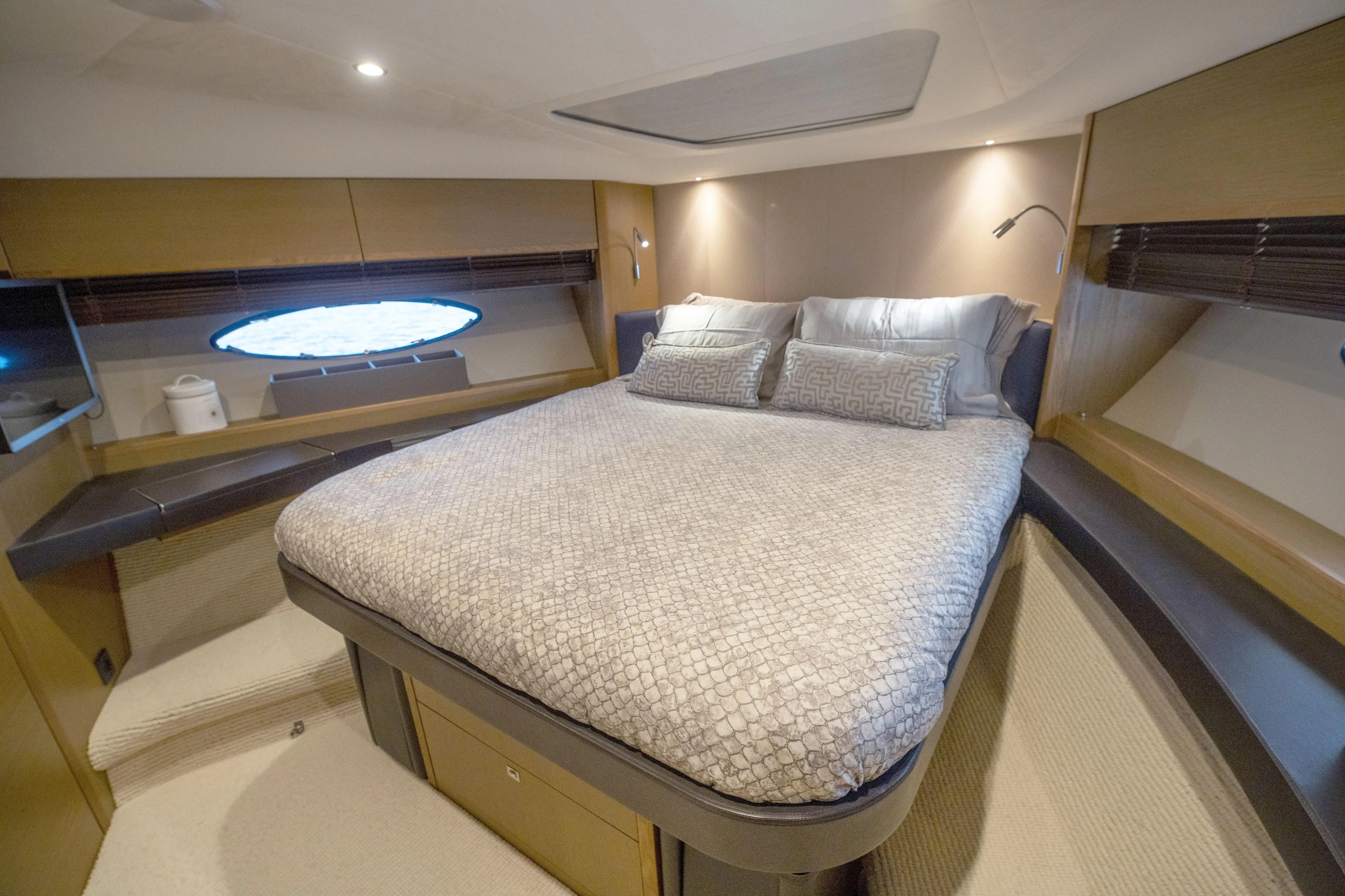  Yacht Photos Pics Luxurious bedroom interior of 2014 Princess 56 yacht with elegant bedding and modern design.