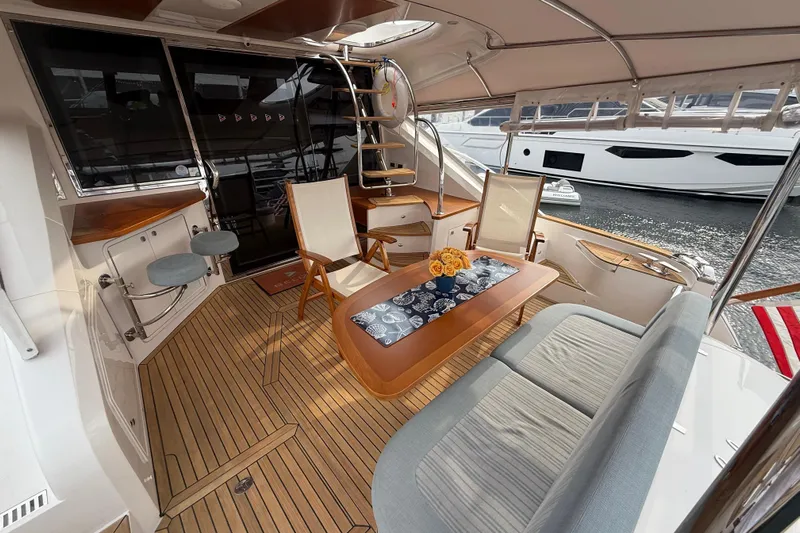 Habibi Yacht Photos Pics Luxurious 2017 Belize 54 Daybridge yacht interior with elegant seating and wooden flooring.