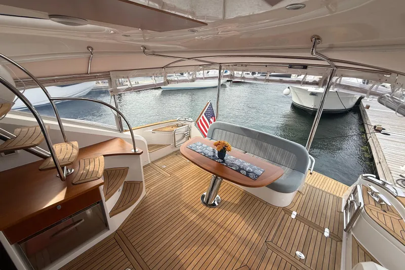 Habibi Yacht Photos Pics Luxurious 2017 Belize 54 Daybridge yacht interior with elegant seating and wooden flooring.