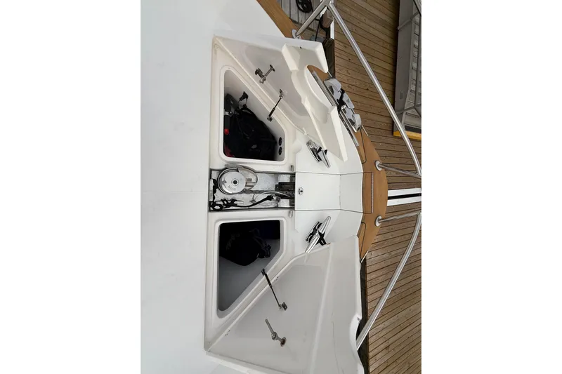 Habibi Yacht Photos Pics 2017 Belize 54 Daybridge yacht deck with open storage compartments and railing.