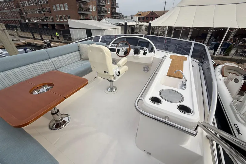 Habibi Yacht Photos Pics Luxurious 2017 Belize 54 Daybridge yacht interior with seating, helm, and outdoor amenities.