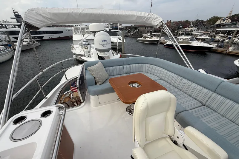 Habibi Yacht Photos Pics Luxurious 2017 Belize 54 Daybridge yacht with spacious seating and elegant design in a marina.