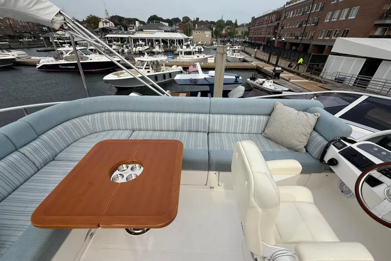 Habibi Yacht Photos Pics Luxurious seating area on 2017 Belize 54 Daybridge yacht, docked at marina.