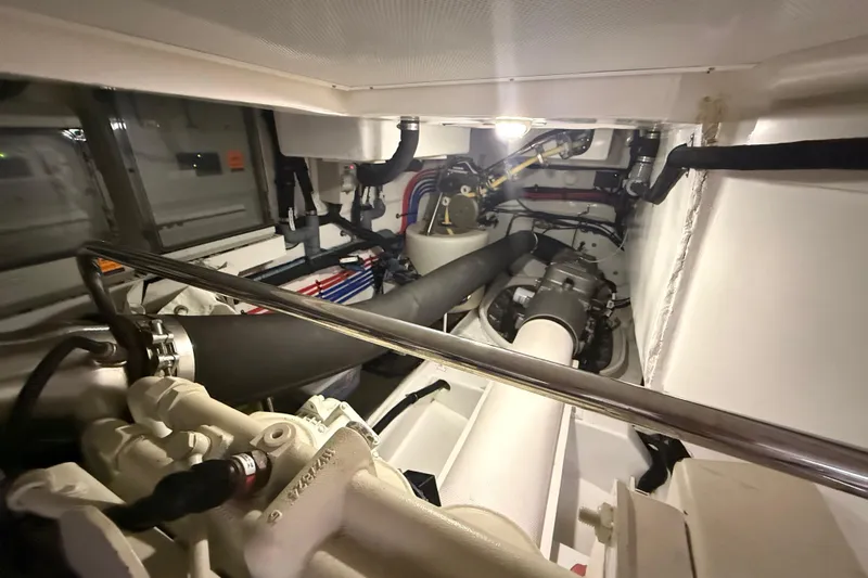 Habibi Yacht Photos Pics Engine room of 2017 Belize 54 Daybridge yacht, showcasing mechanical components and piping.