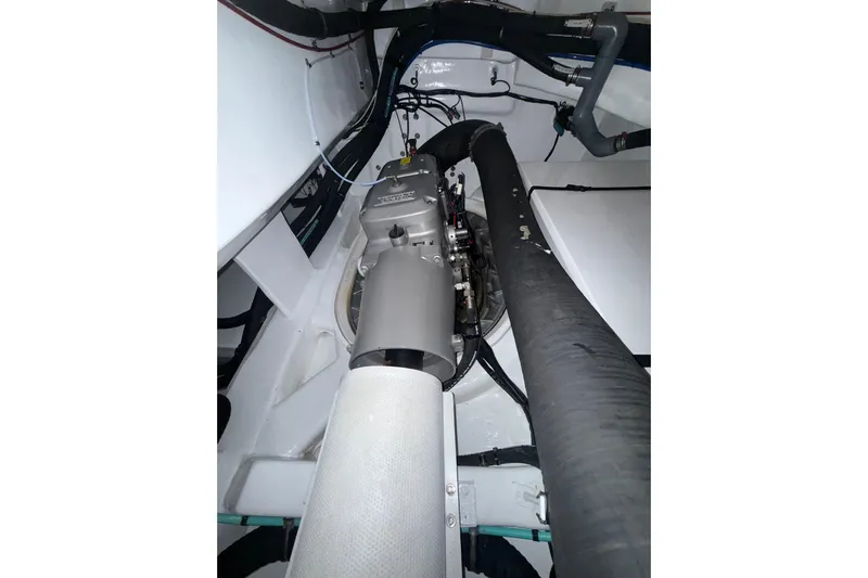 Habibi Yacht Photos Pics Engine room of 2017 Belize 54 Daybridge yacht, showcasing mechanical components and piping.