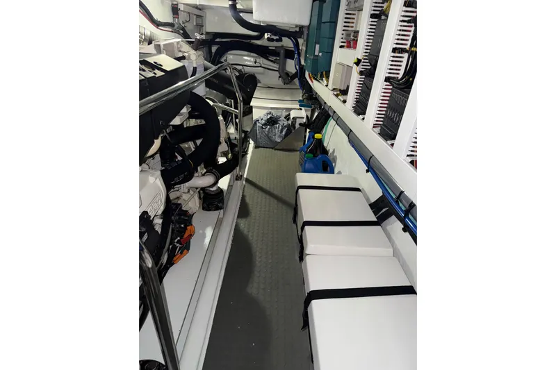 Habibi Yacht Photos Pics Engine room of 2017 Belize 54 Daybridge yacht, showcasing equipment and storage areas.