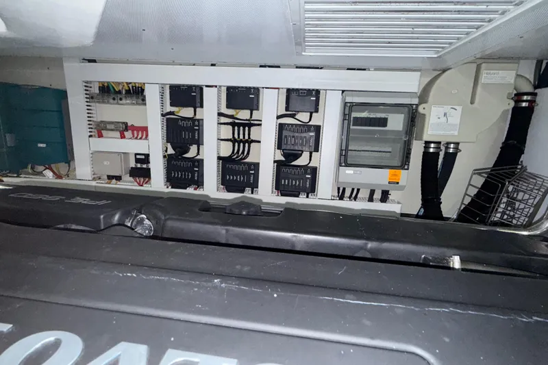 Habibi Yacht Photos Pics Electrical panel inside 2017 Belize 54 Daybridge yacht, showcasing wiring and components.
