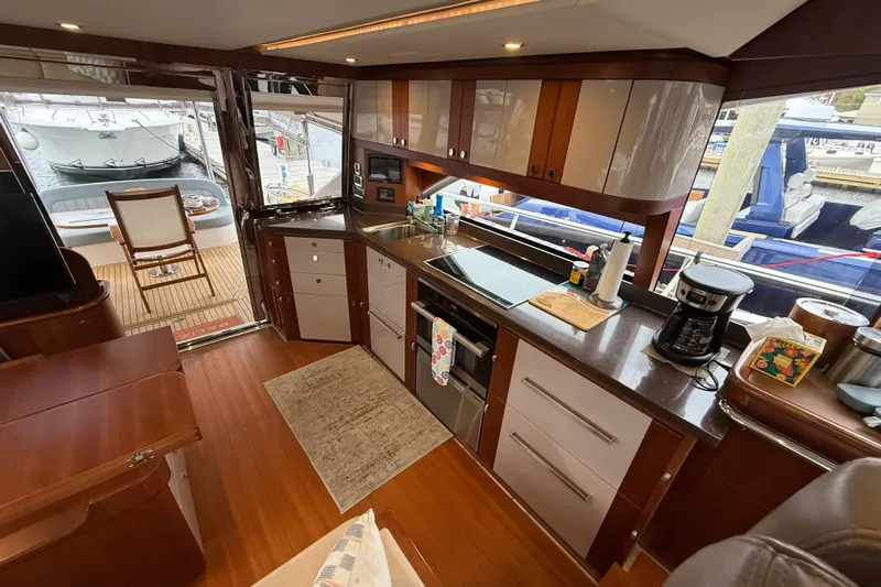 Habibi Yacht Photos Pics Luxurious kitchen interior of 2017 Belize 54 Daybridge yacht with modern amenities.