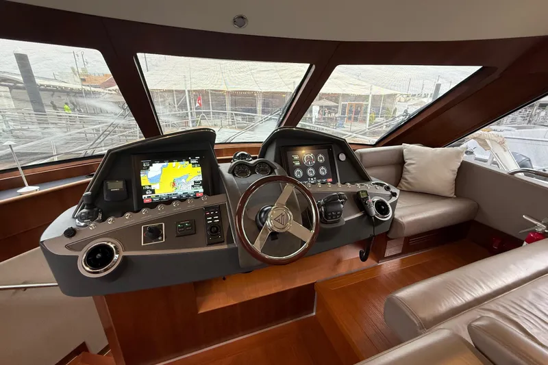 Habibi Yacht Photos Pics Luxurious helm of 2017 Belize 54 Daybridge yacht with advanced navigation systems.