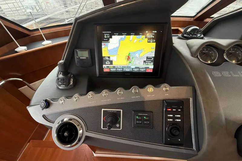 Habibi Yacht Photos Pics Control panel of a 2017 Belize 54 Daybridge yacht with navigation display and controls.