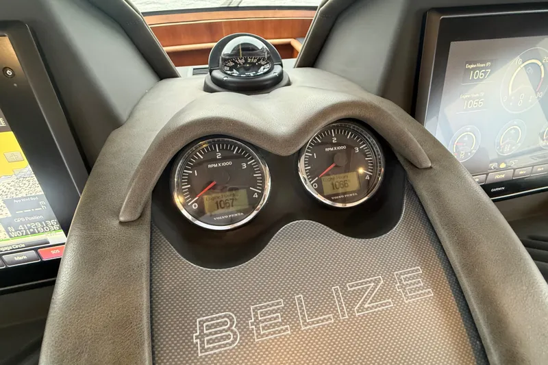 Habibi Yacht Photos Pics Dashboard of 2017 Belize 54 Daybridge yacht with RPM gauges and navigation screens.