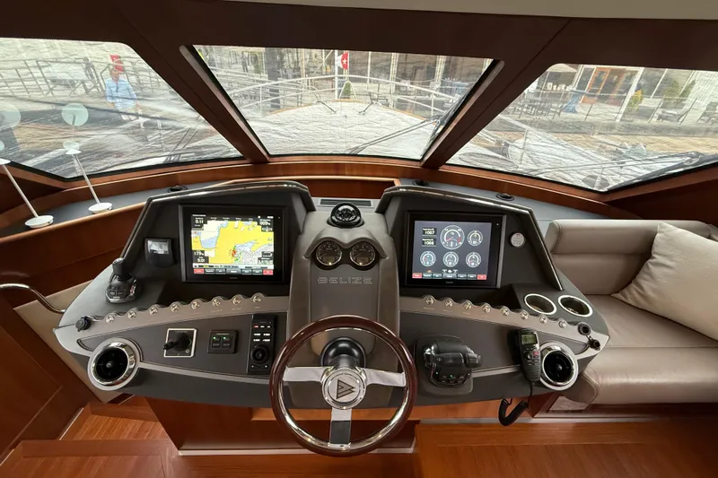 Habibi Yacht Photos Pics Helm of 2017 Belize 54 Daybridge yacht with advanced navigation displays and controls.