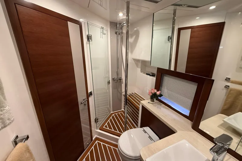 Habibi Yacht Photos Pics Luxurious bathroom in 2017 Belize 54 Daybridge yacht with modern fixtures and elegant wood accents.