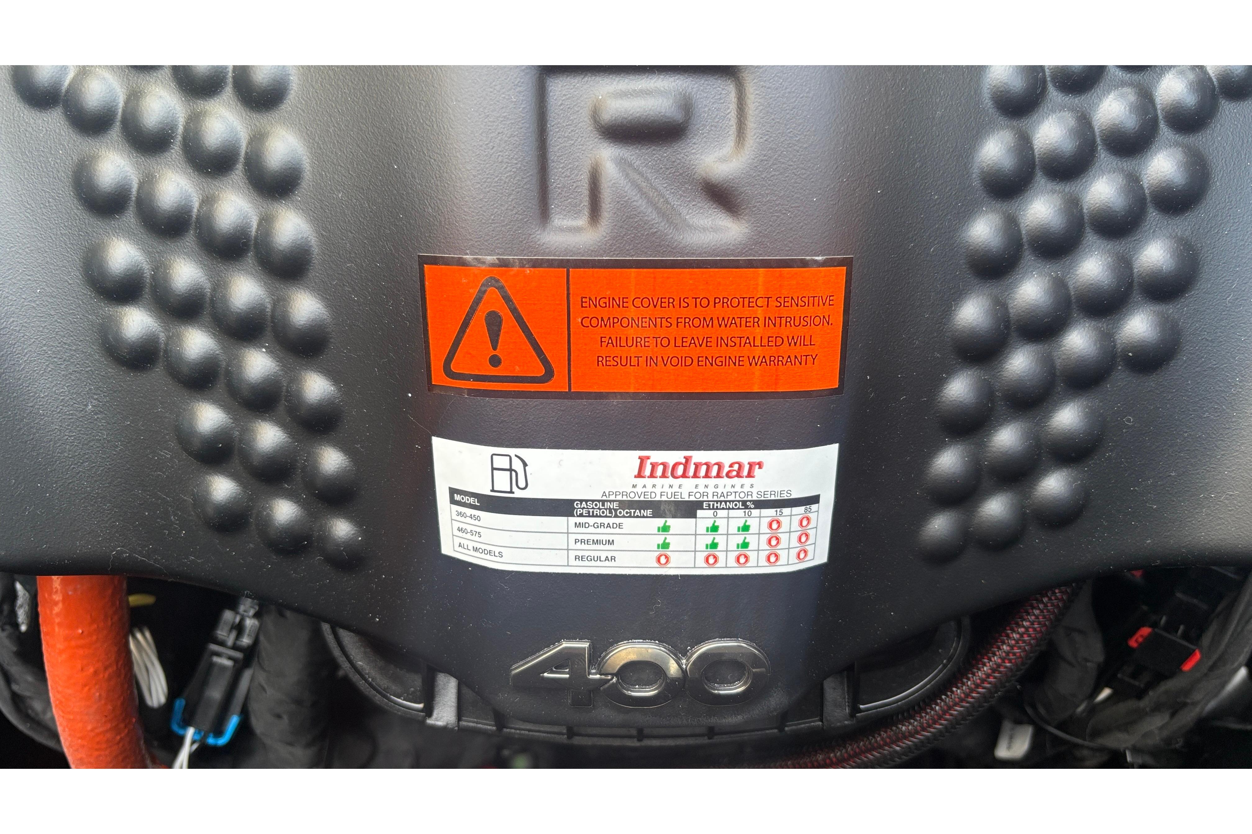 Engine cover of 2026 MB B52 23 Classic with Indmar label and warning sign.