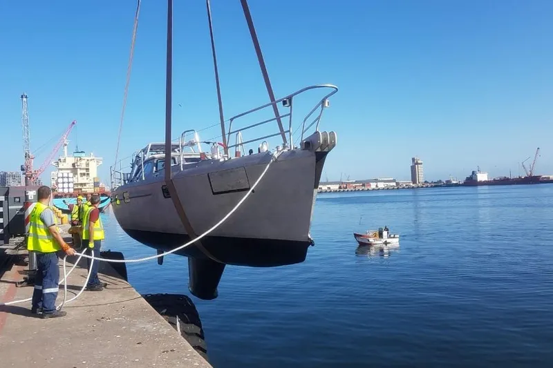 Espresso Yacht Photos Pics Custom Southwell Sovereign 51 yacht being lifted at a dock, 2019.