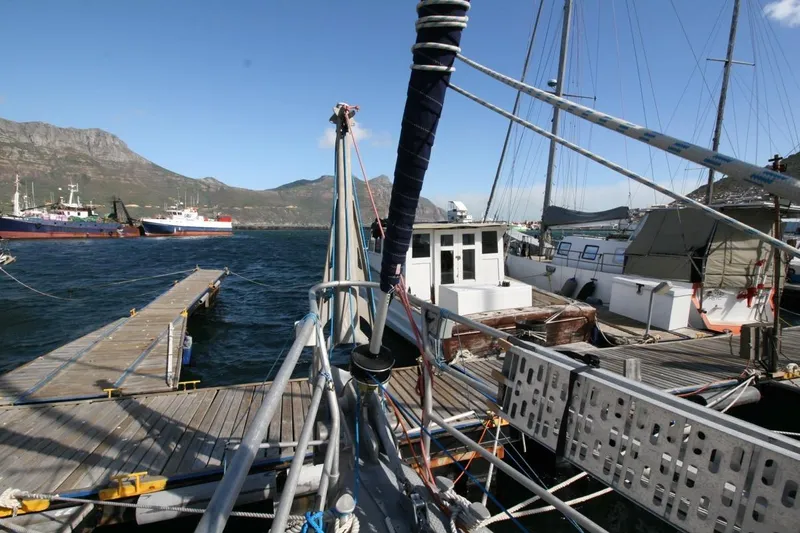 Espresso Yacht Photos Pics Sailboat docked at marina with mountains in background, Custom Southwell Sovereign 51, 2019.
