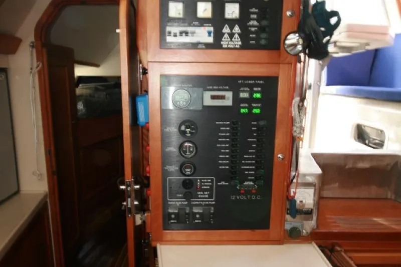 Espresso Yacht Photos Pics Electrical control panel inside 2019 Custom Southwell Sovereign 51 yacht cabin.