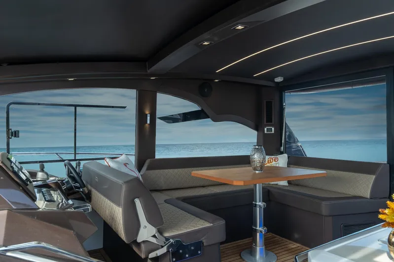  Yacht Photos Pics Interior of 2022 Galeon 425 HTS yacht with modern seating and ocean view.