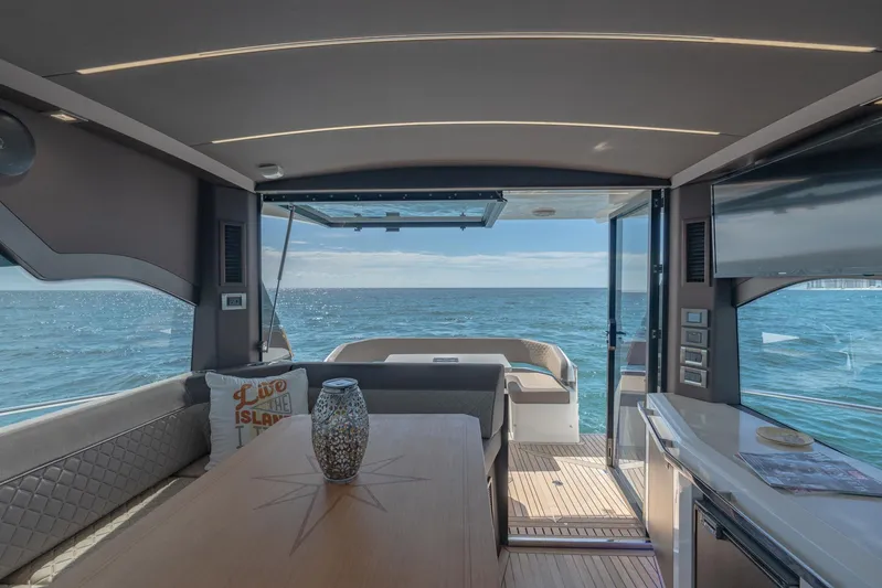  Yacht Photos Pics Interior view of 2022 Galeon 425 HTS yacht with ocean backdrop.