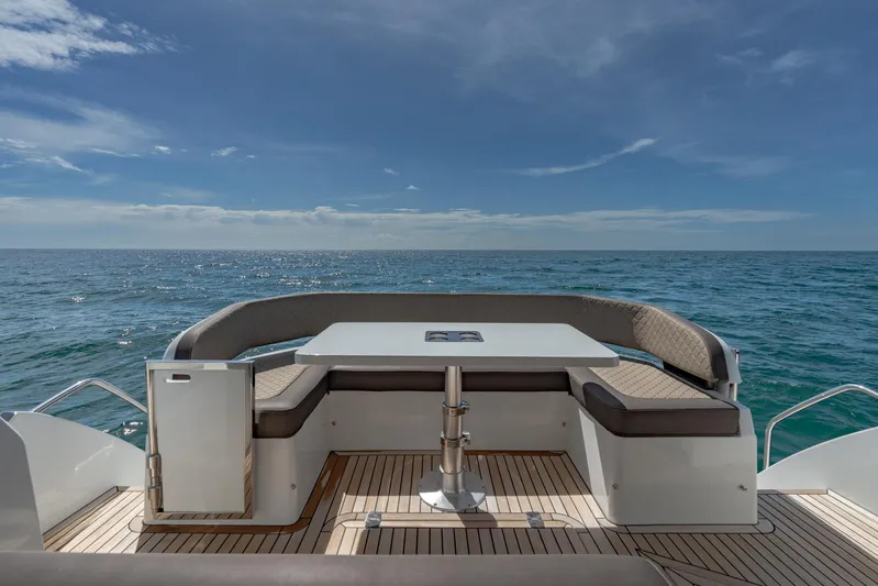  Yacht Photos Pics 2022 Galeon 425 HTS yacht deck with seating area overlooking the ocean.