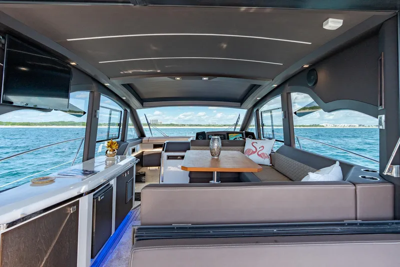  Yacht Photos Pics Interior of 2022 Galeon 425 HTS yacht with modern seating and ocean view.