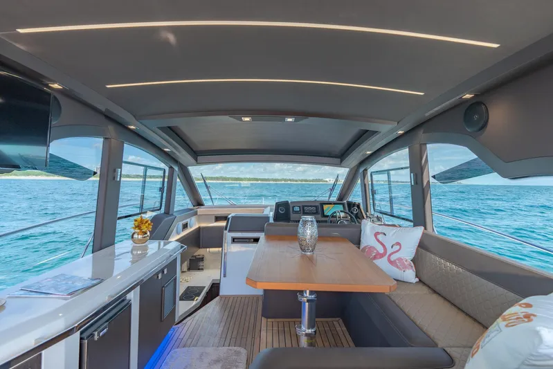  Yacht Photos Pics Interior of 2022 Galeon 425 HTS yacht with modern seating and ocean view.