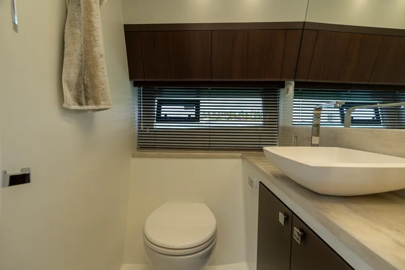  Yacht Photos Pics Modern bathroom interior in 2022 Galeon 425 HTS yacht, featuring sleek design and fixtures.