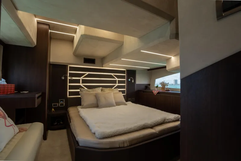  Yacht Photos Pics Luxurious interior of 2022 Galeon 425 HTS yacht bedroom with modern lighting.