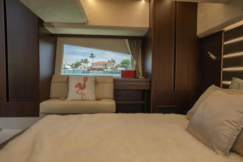  Yacht Photos Pics Luxurious interior of 2022 Galeon 425 HTS yacht with cozy bed and scenic window view.