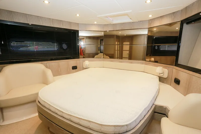 Yacht Photos Pics Luxurious interior of 2019 Azimut Magellano 53 yacht with elegant bedroom design.