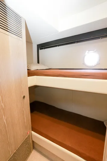  Yacht Photos Pics Bunk beds in 2019 Azimut Magellano 53 yacht cabin with porthole window.